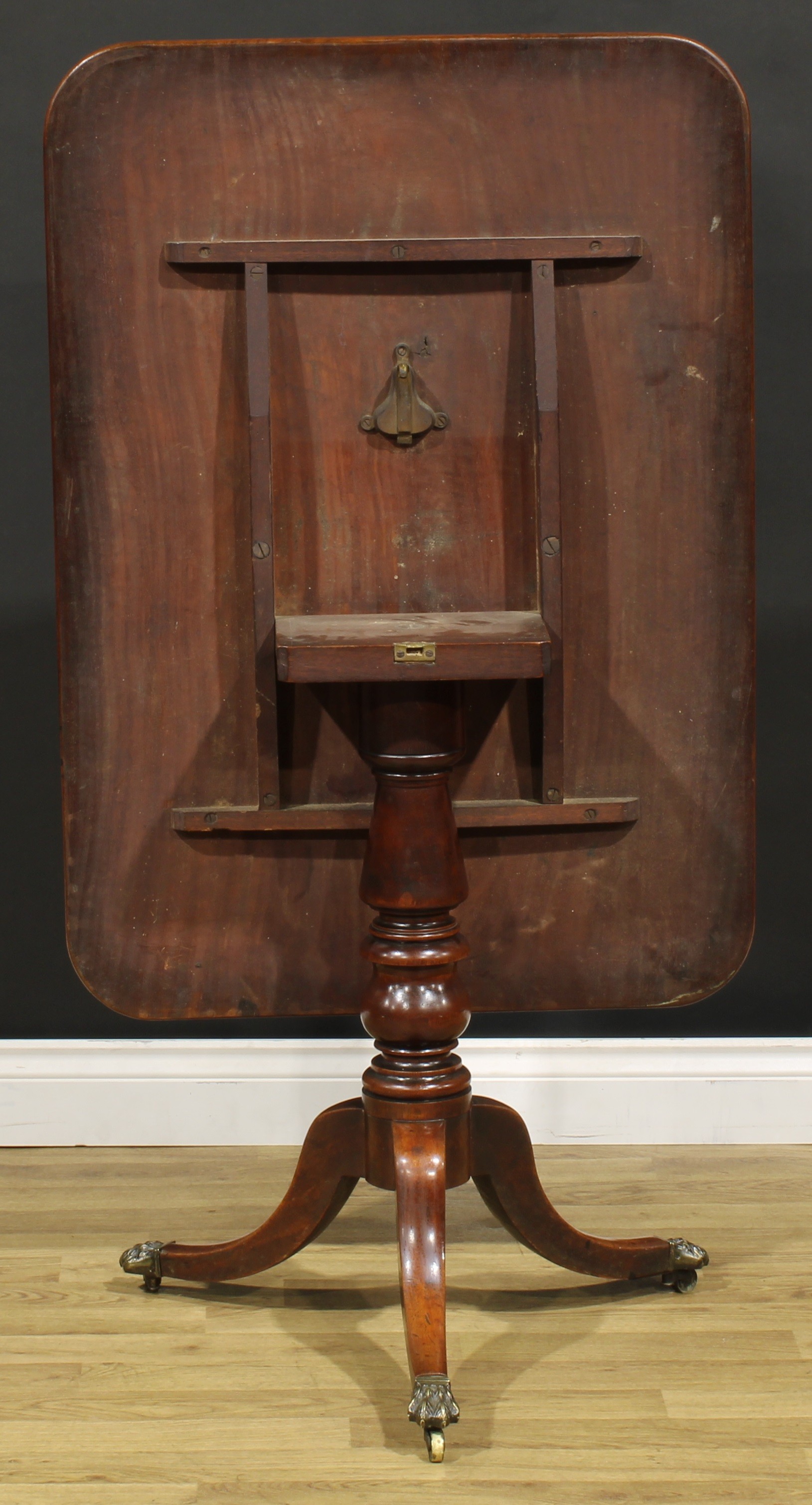 A Regency mahogany tripod supper table, rounded rectangular tilting top with channelled edge, turned - Image 4 of 4