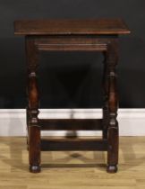 An 18th century oak joint stool, rectangular top with moulded edge, turned legs, rectangular