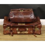 Vintage Luggage - a leather suitcase, bearing fragmentary labels for Southern Railway, 66cm wide;
