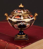 A Royal Crown Derby 1128 Imari pattern two-handled campana shaped vase and cover, of compressed