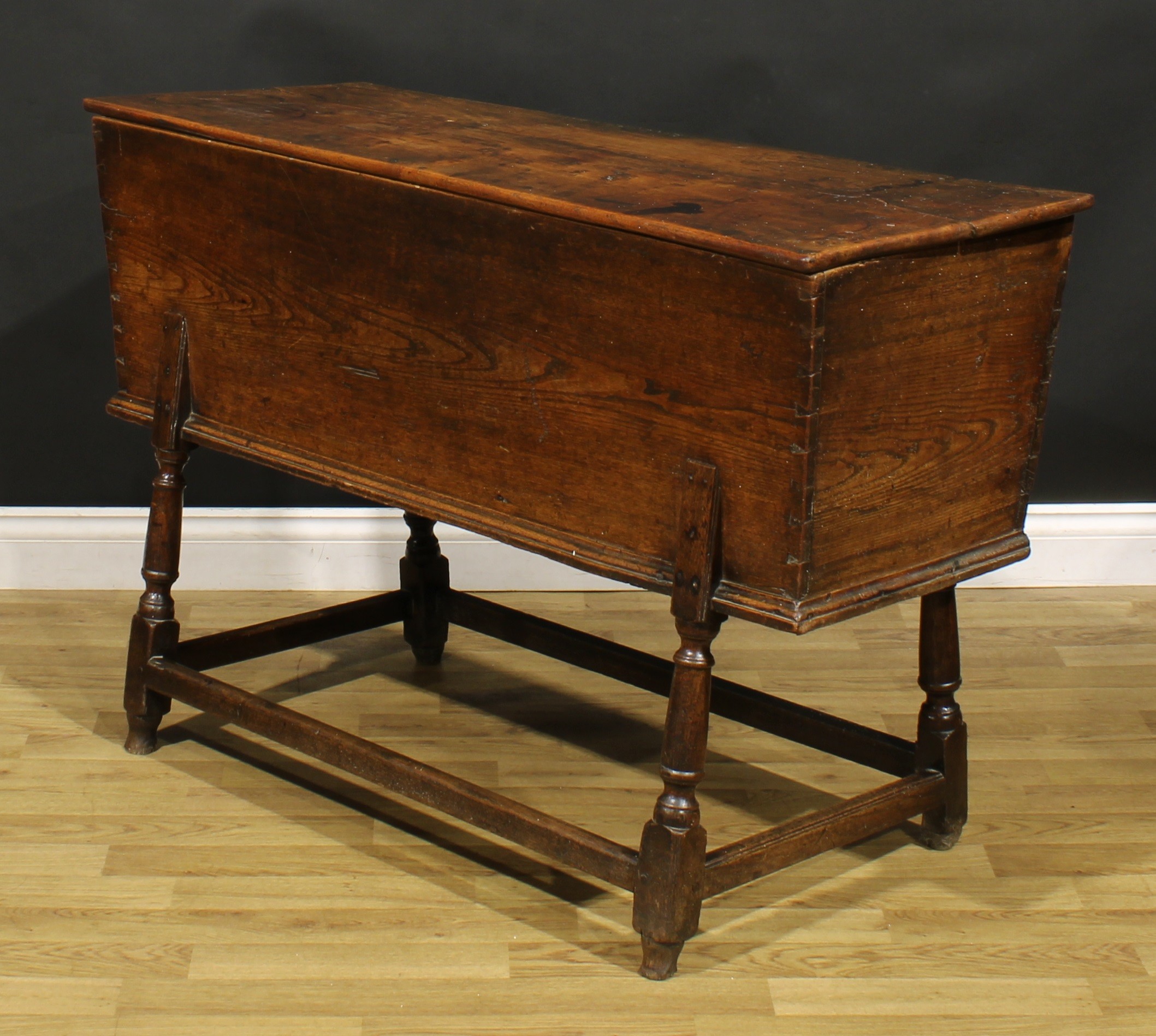 An 18th century elm dough bin, the base with turned legs, 76cm high, 121cm wide, 45cm deep - Image 4 of 5