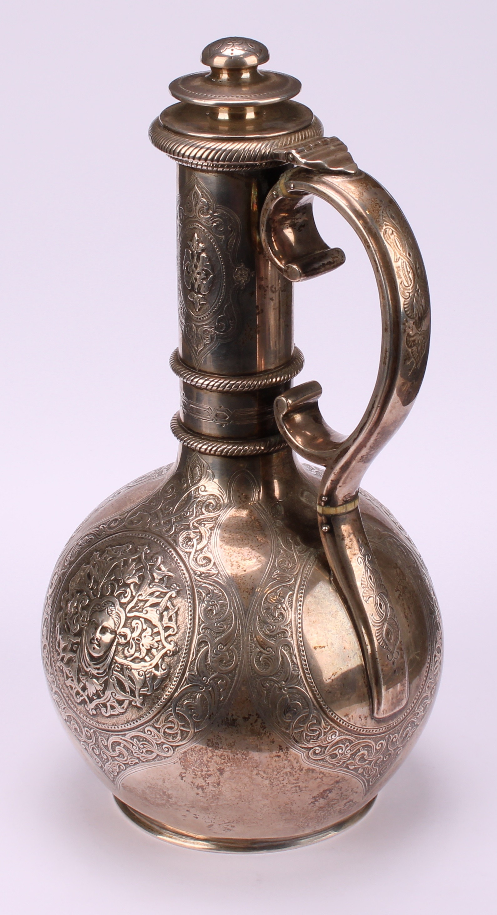 A Victorian silver globular wine ewer, chased with Green Man mask and mask of a classical lady, - Image 5 of 6
