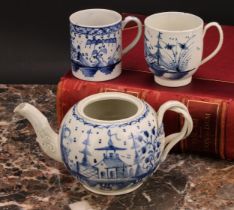 An 18th century Staffordshire pearlware globular teapot, painted in underglaze blue with a
