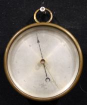 A 19th century French lacquered brass aneroid barometer, 11cm silvered register inscribed