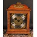 An early to mid 20th century walnut bracket-form mantel clock, 17.5cm brass dial with silvered