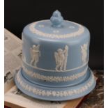 A late Victorian Staffordshire Jasperware cheese dome, probably James Dudson, sprigged in white