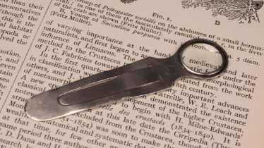 Sampson Mordan & Co - a Victorian silver novelty combination bookmark and magnifying glass, 9cm