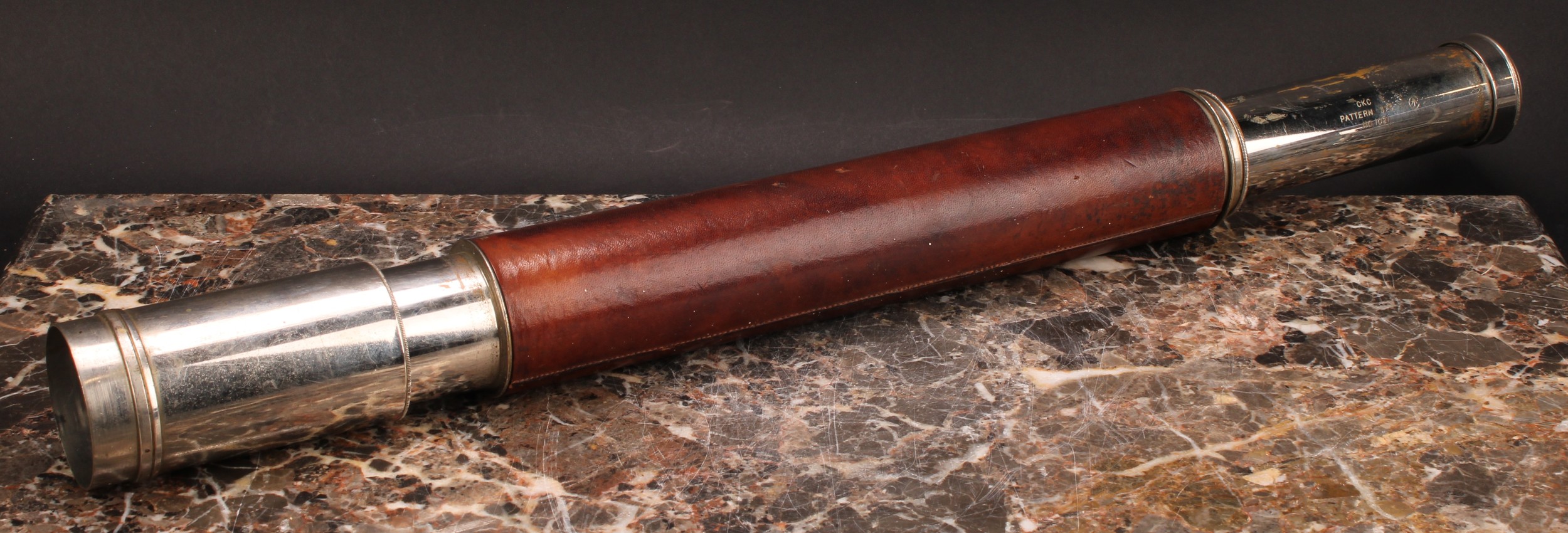 A leather bound military telescope, CKC Pattern 373 No.1021, broad arrow mark, extending to 67cm - Image 2 of 4