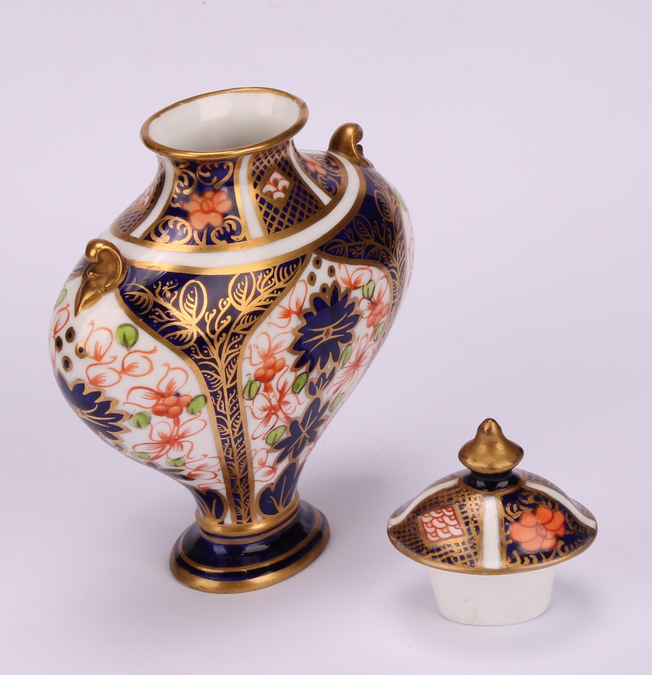 An associated pair of Royal Crown Derby 1128 Imari pattern flattened ovoid pedestal vases, oval - Image 10 of 12