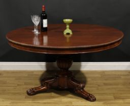 A 19th century mahogany centre table, possibly Irish, circular tilting top with reel moulded edge,