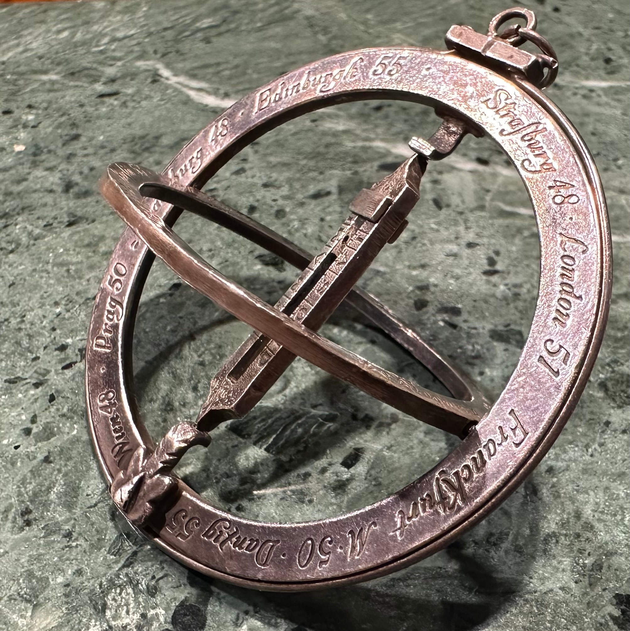 A 17th century style silver coloured metal universal scientific equinoctial ring sundial, bears - Image 5 of 5