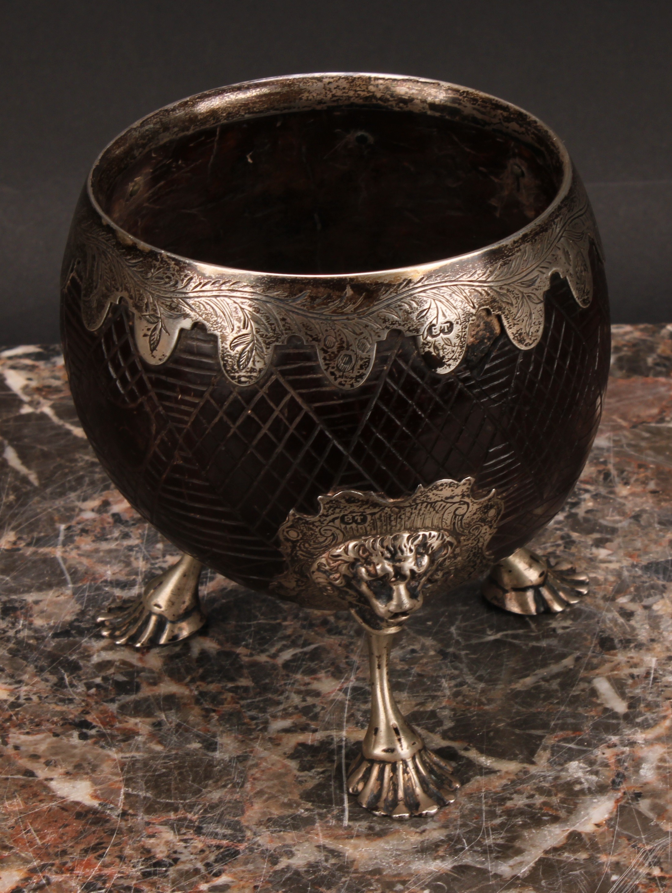 A George III silver mounted coconut cup, the fittings engraved with leafy stems, on a hatched - Image 3 of 4