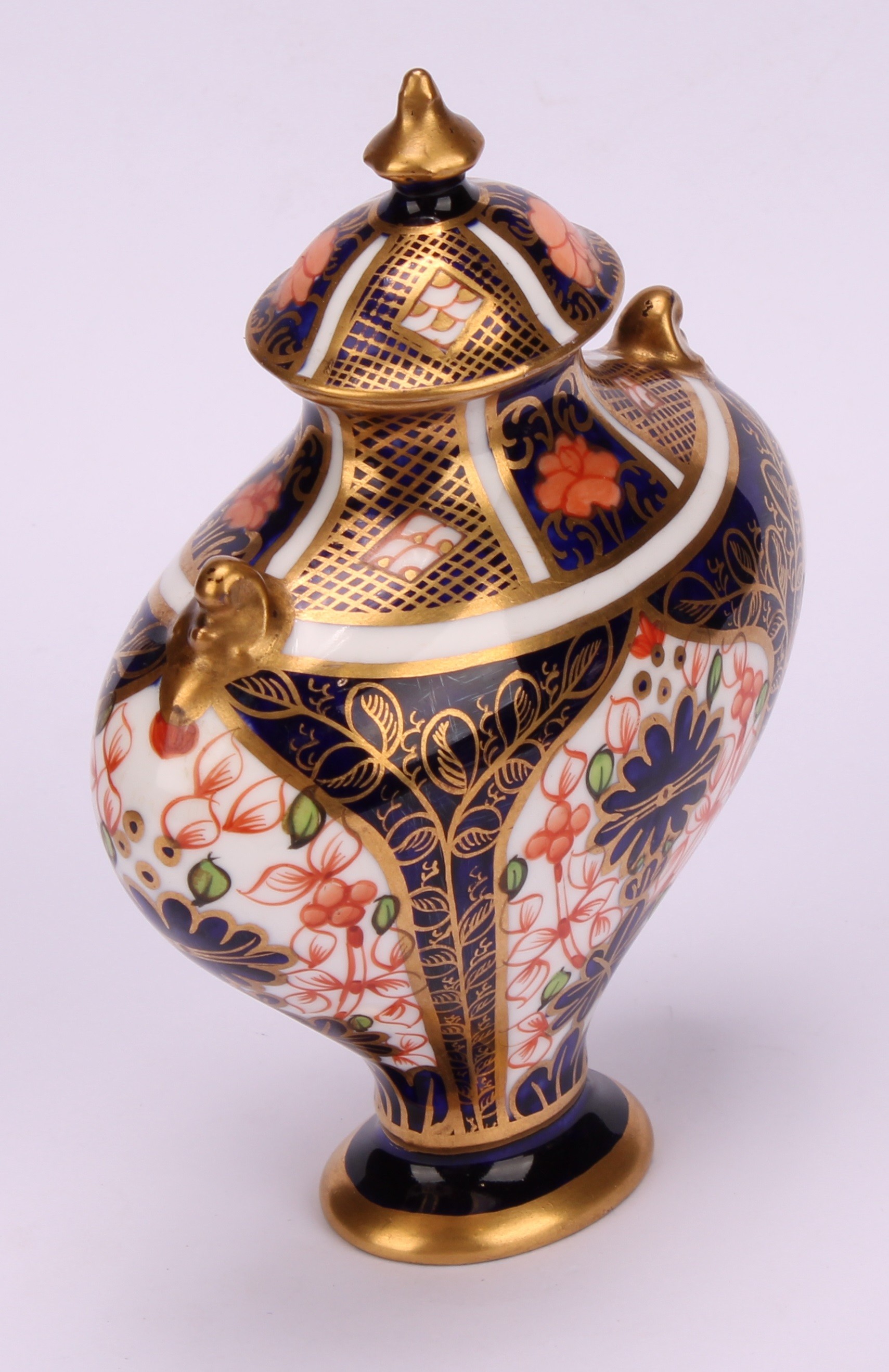 An associated pair of Royal Crown Derby 1128 Imari pattern flattened ovoid pedestal vases, oval - Image 4 of 12