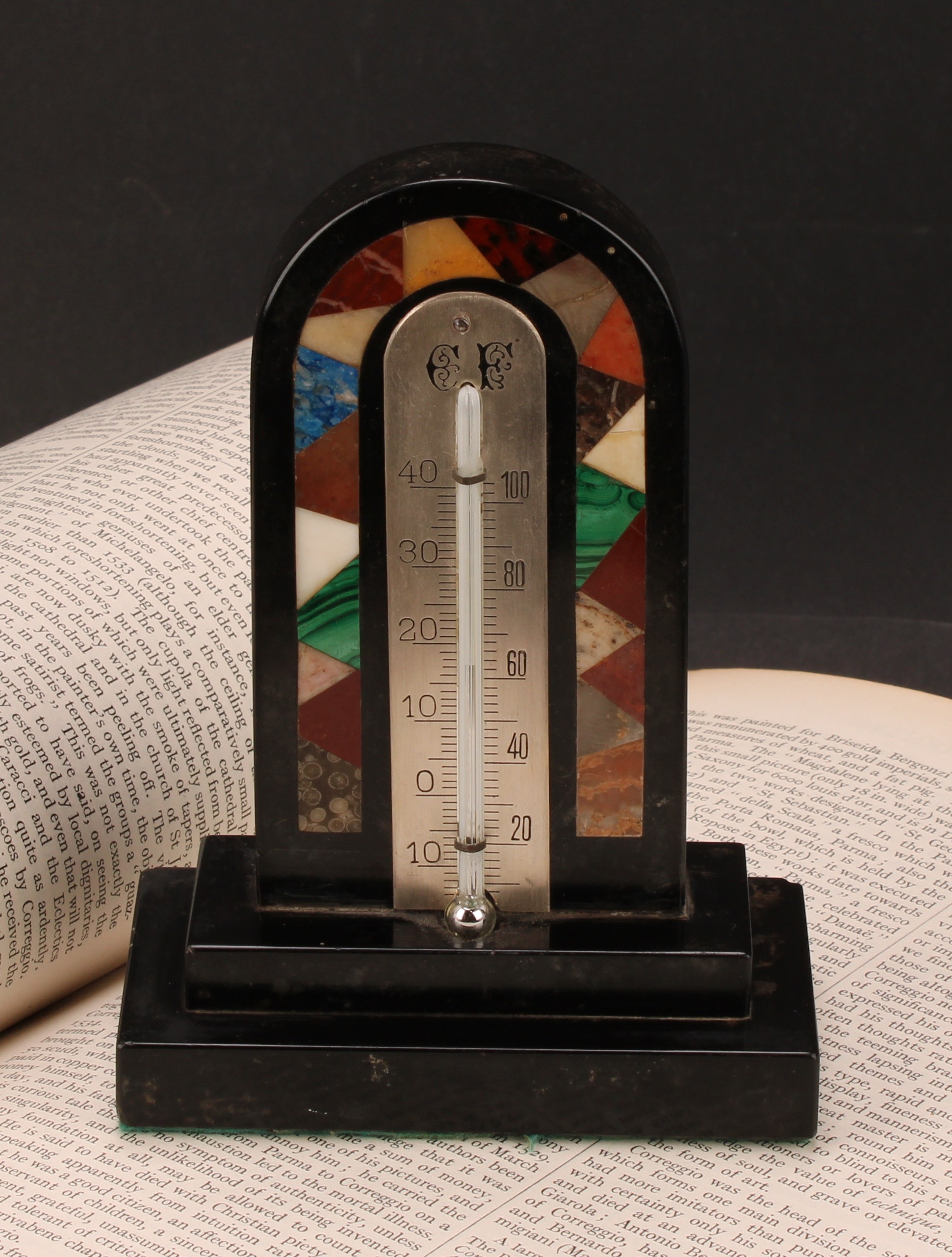 A Derbyshire Ashford black marble table-top thermometer, inlaid with malachite, lapis lazuli and