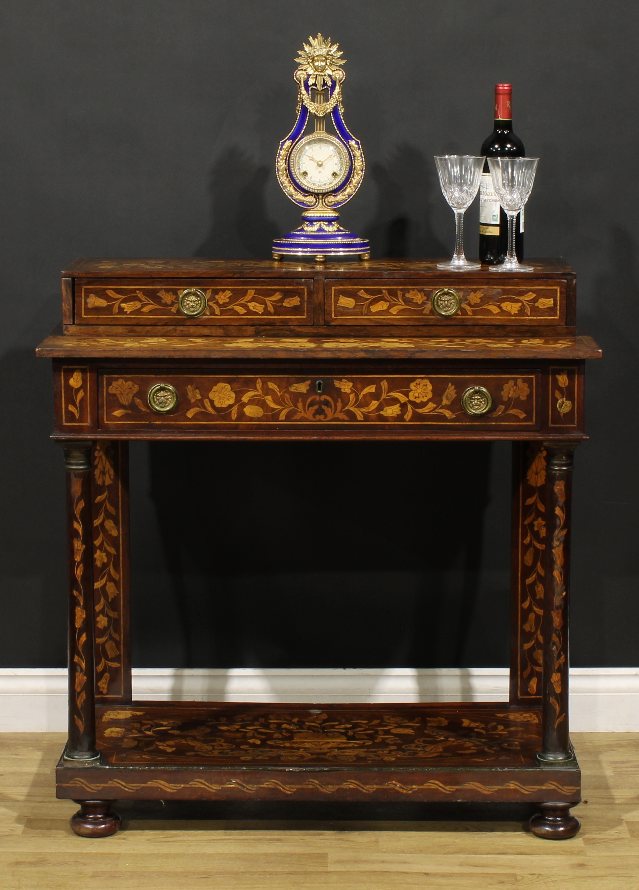 A 19th century Dutch marquetry pier table, rectangular superstructure with a pair of short