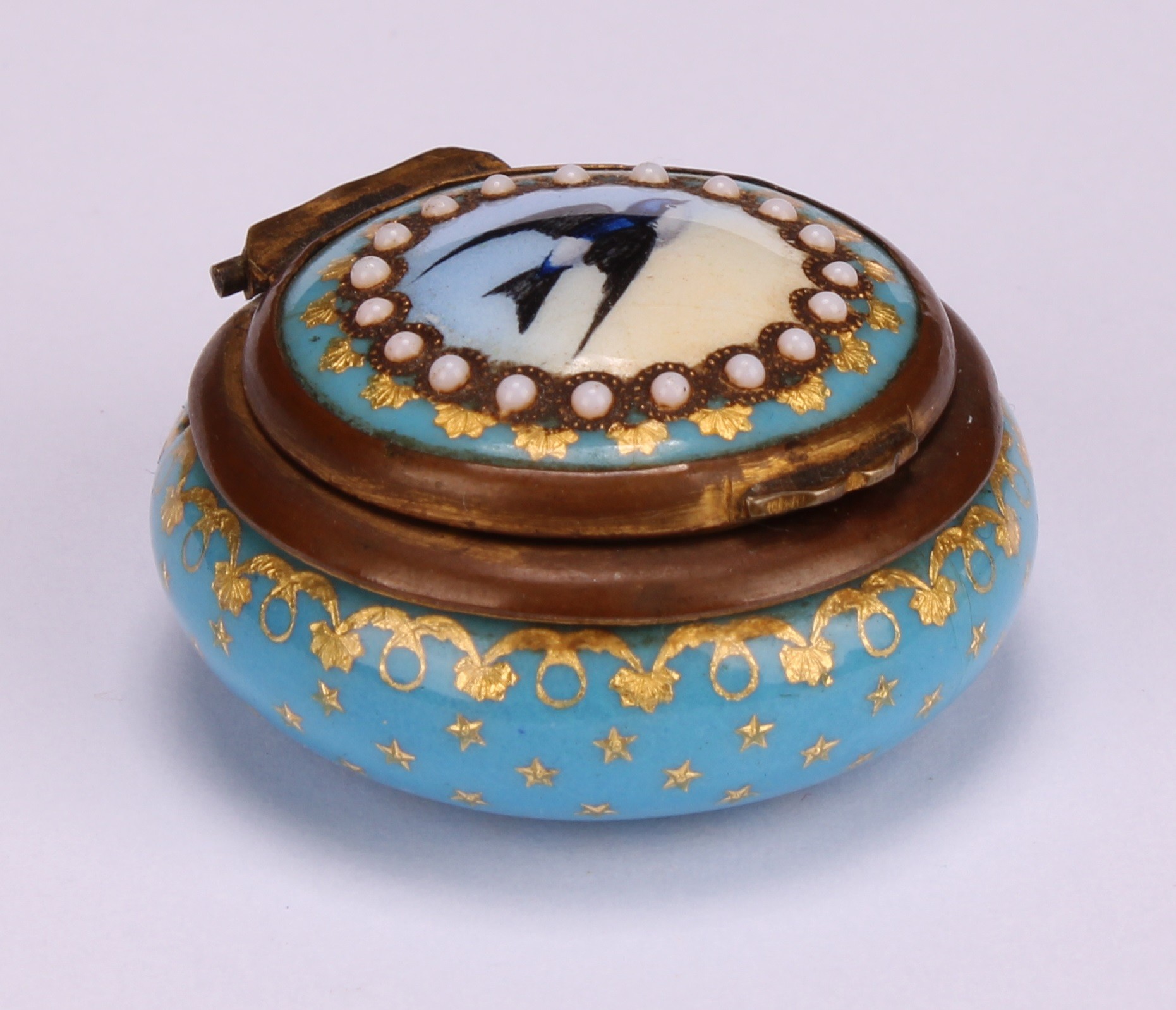 A 19th century French Palais Royal enamel circular rouge box, hinged cover decorated with a swallow, - Image 3 of 5