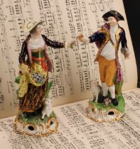 A pair of Derby figures, Shepherd and Shepherdess, he wearing a broad brimmed black hat, blue