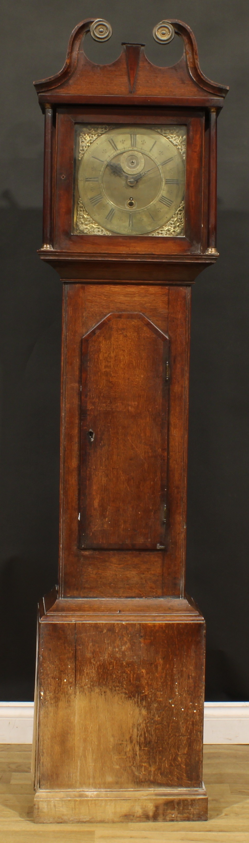 An 18th century oak and mahogany longcase clock, 27.5cm square brass dial inscribed Tho Binch