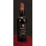 Wines and Spirits - Dow's 1945 Vintage Port, level mid shoulder, seal present but part missing
