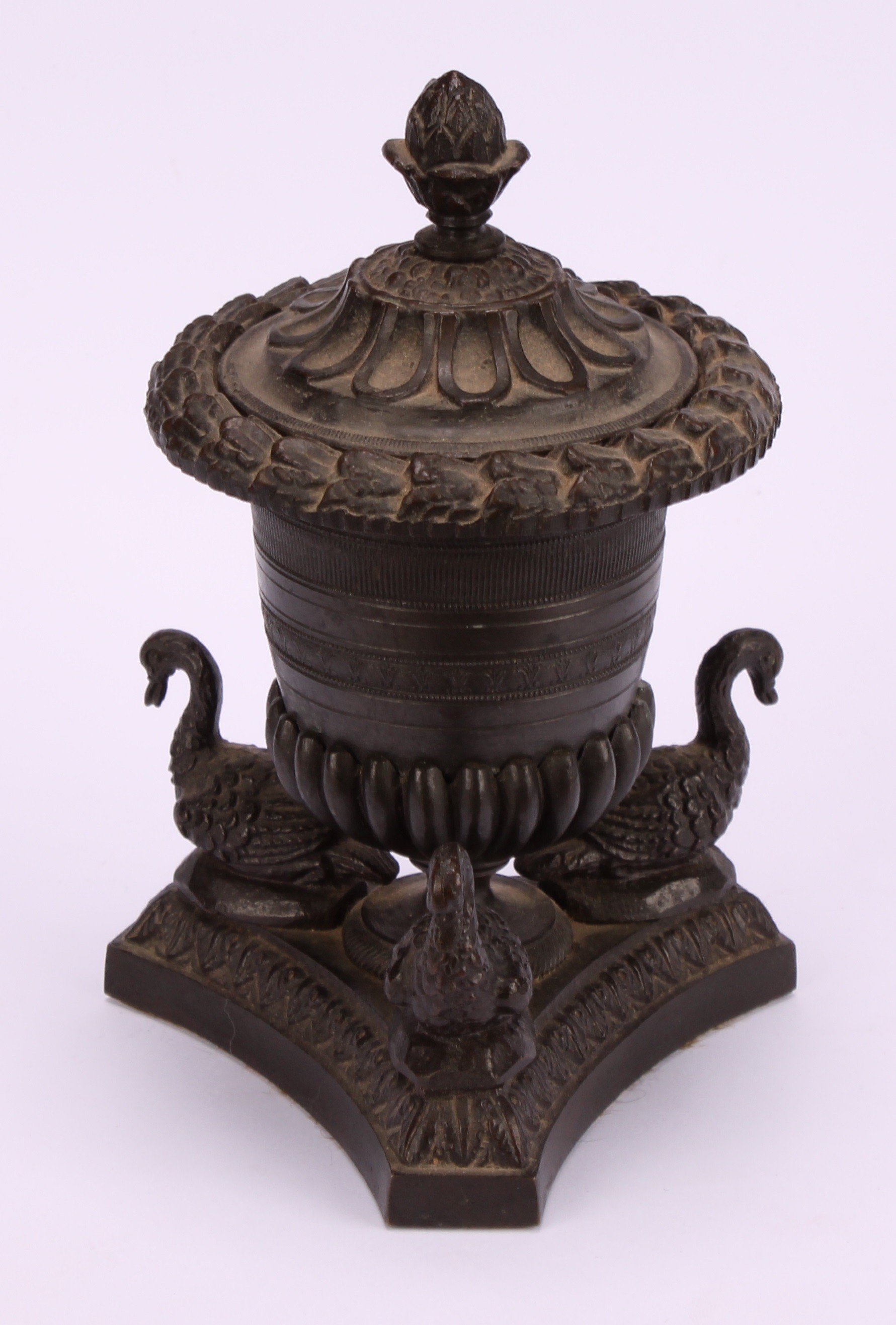 A Regency dark patinated bronze half-fluted campana inkwell, the incurve canted triform base applied - Image 3 of 4