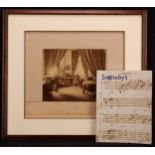 Franz Liszt - a large photograph, signed and inscribed, showing Liszt in his study at Weimar, by