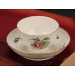 A Caughley teabowl and saucer, painted in polychrome with Back to Back Roses pattern, gilt line