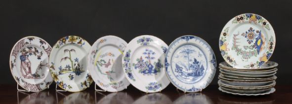 An 18th century Delft circular plate, painted in the chinoiserie taste with a figure in a Chinese
