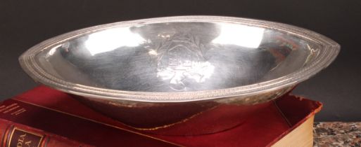 An early 19th century Spanish silver navette shaped dish, the border chased with a double band of