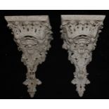 A pair of 19th century gesso wall brackets, moulded throughout with shells and scrolling acanthus,