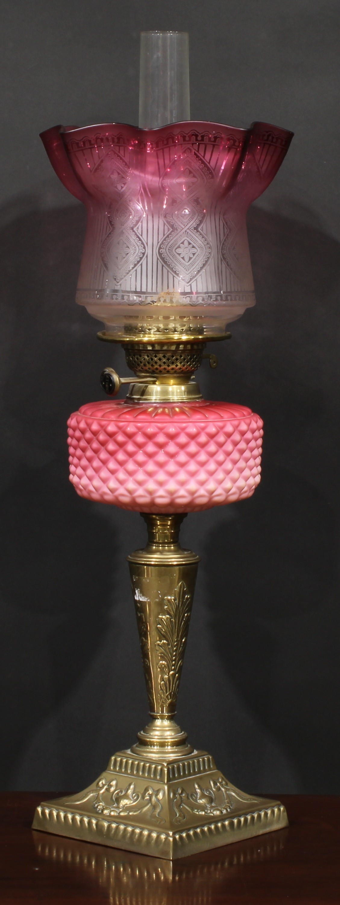 A Victorian brass and pink Vaseline glass table oil lamp, etched cranberry flashed shade, the base - Image 2 of 2