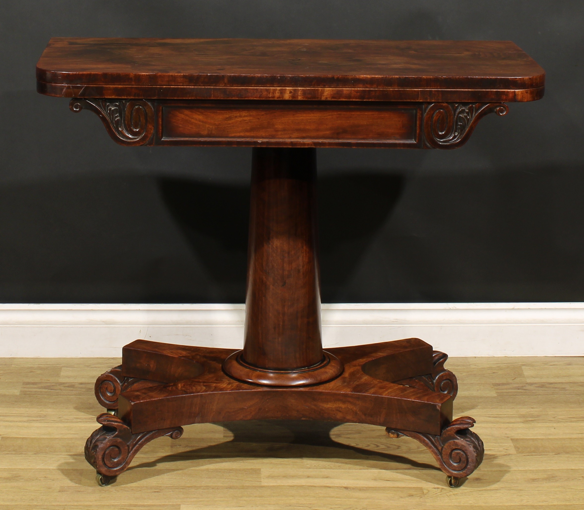 A George/William IV mahogany tea table, rounded rectangular folding top above a deep frieze carved - Image 2 of 6