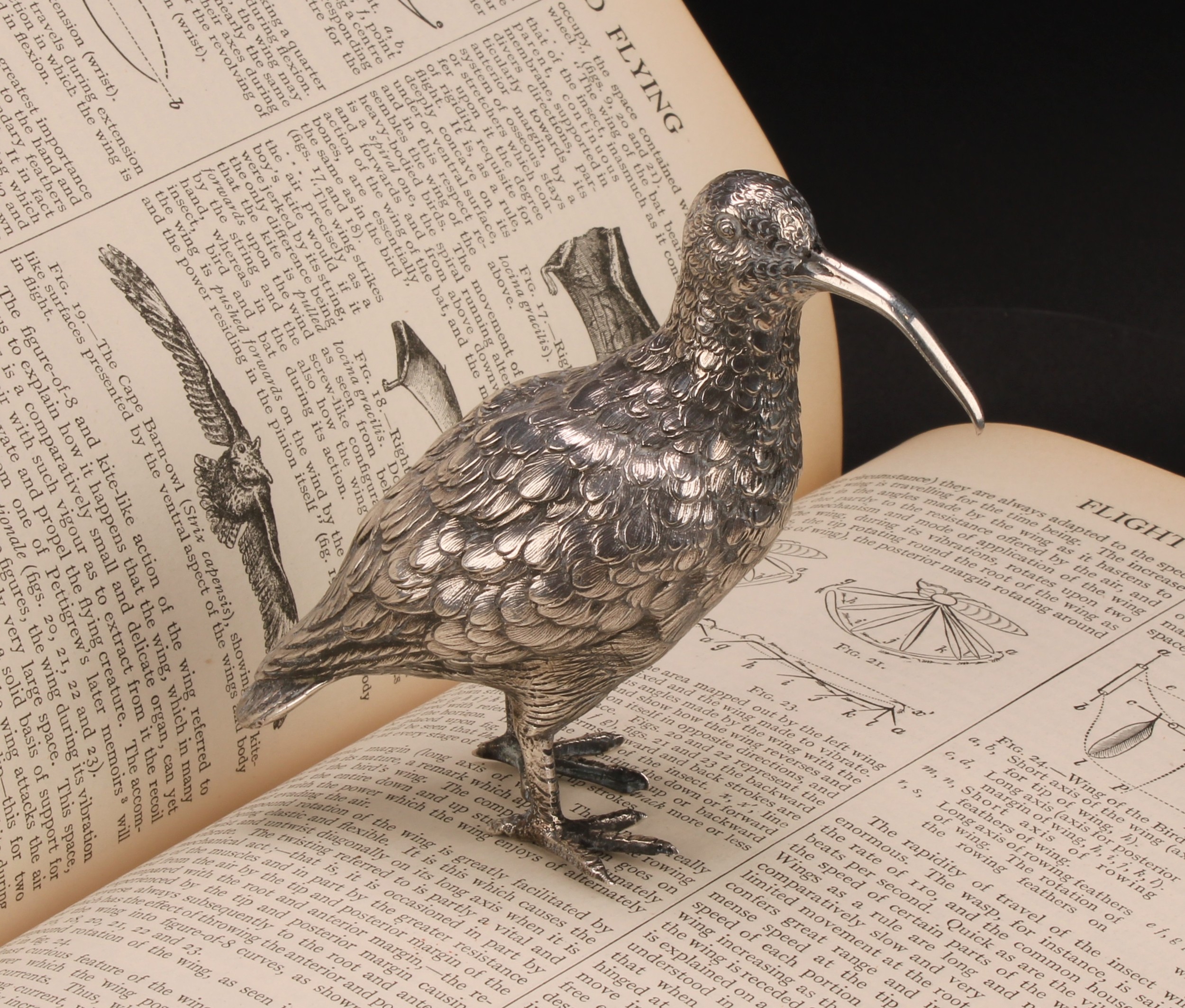 A Continental silver model or table decoration, cast as a snipe, 10cm high, c.1900, 162g