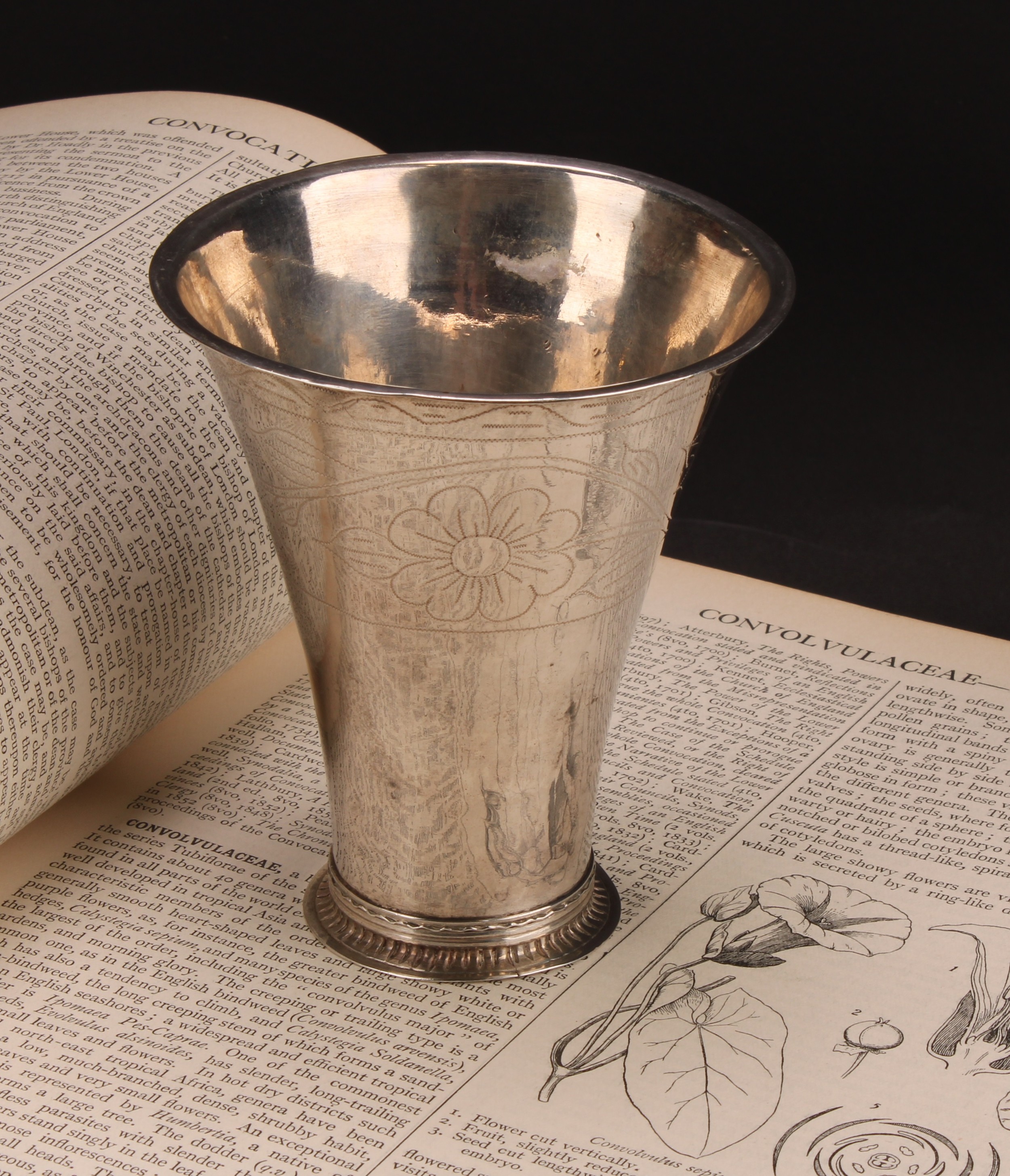 A Swedish silver flared beaker, wrigglework engraved with flowers on a meandering stem, skirted