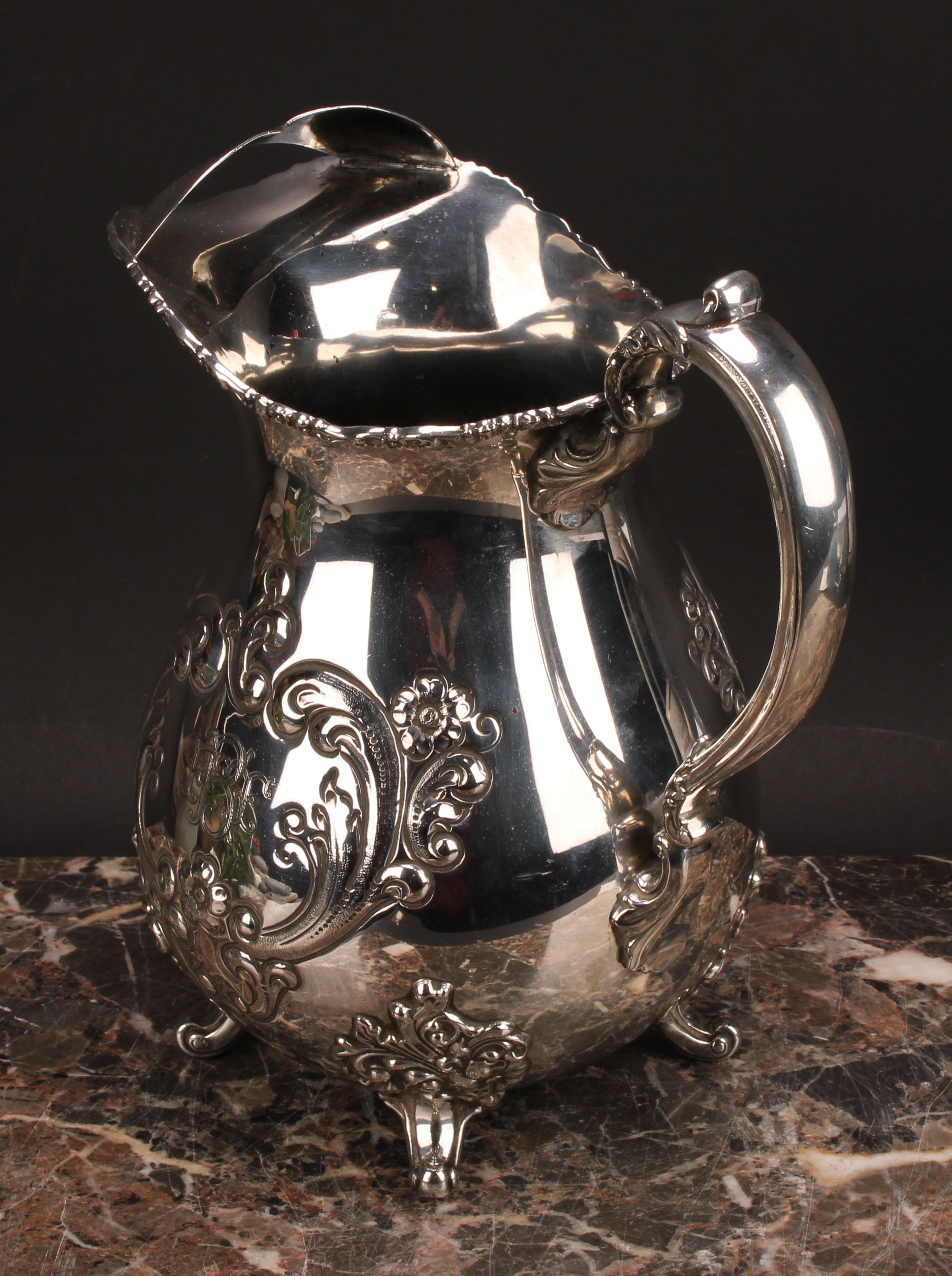 An American silver Pimm's jug, chased with flowers and scrolling leaves, 21cm high, Poole Silver Co, - Image 4 of 5