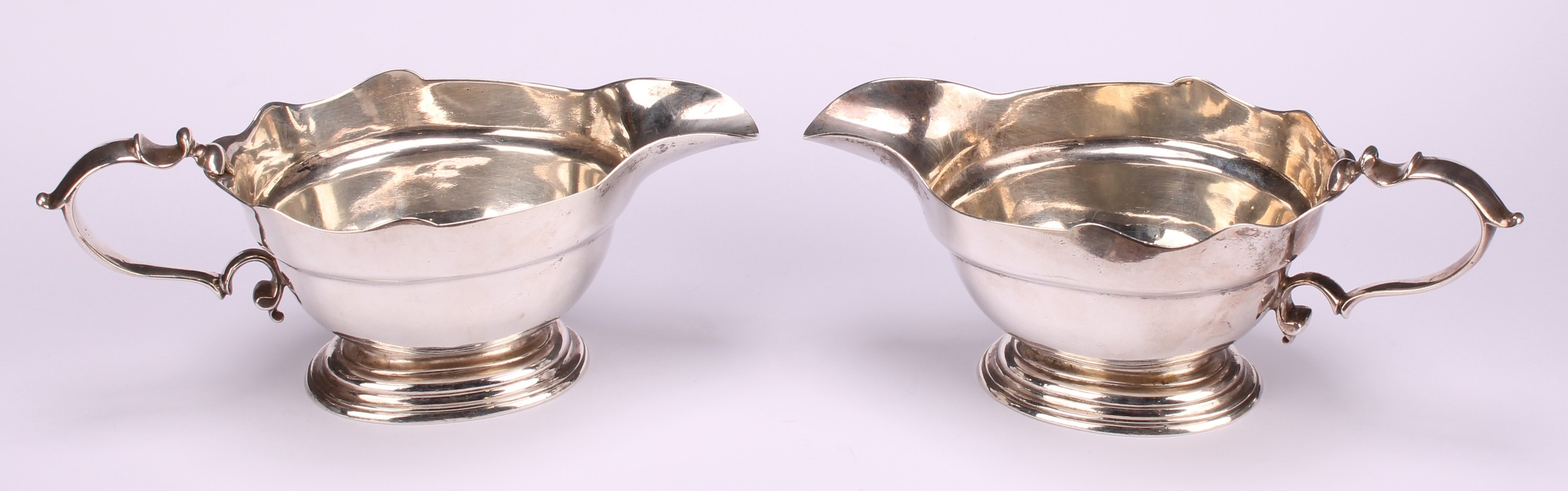 A pair of early George II silver sauce boats, wavy borders, scroll handles, cast bases, 19.5cm long, - Image 2 of 8