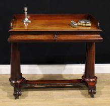 An early Victorian mahogany washstand, rectangular top with three-quarter gallery above a pair of