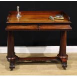 An early Victorian mahogany washstand, rectangular top with three-quarter gallery above a pair of