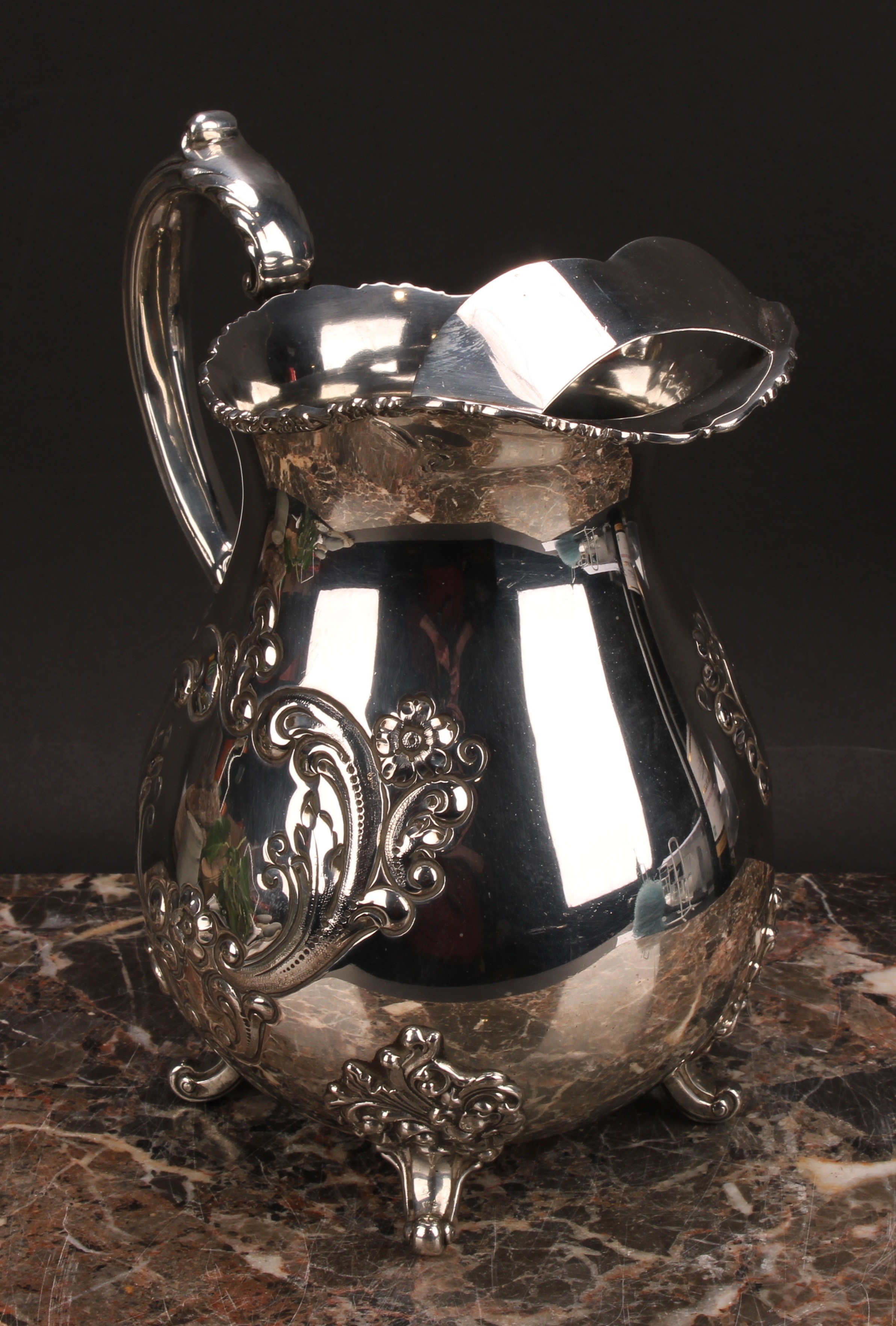 An American silver Pimm's jug, chased with flowers and scrolling leaves, 21cm high, Poole Silver Co, - Image 3 of 5