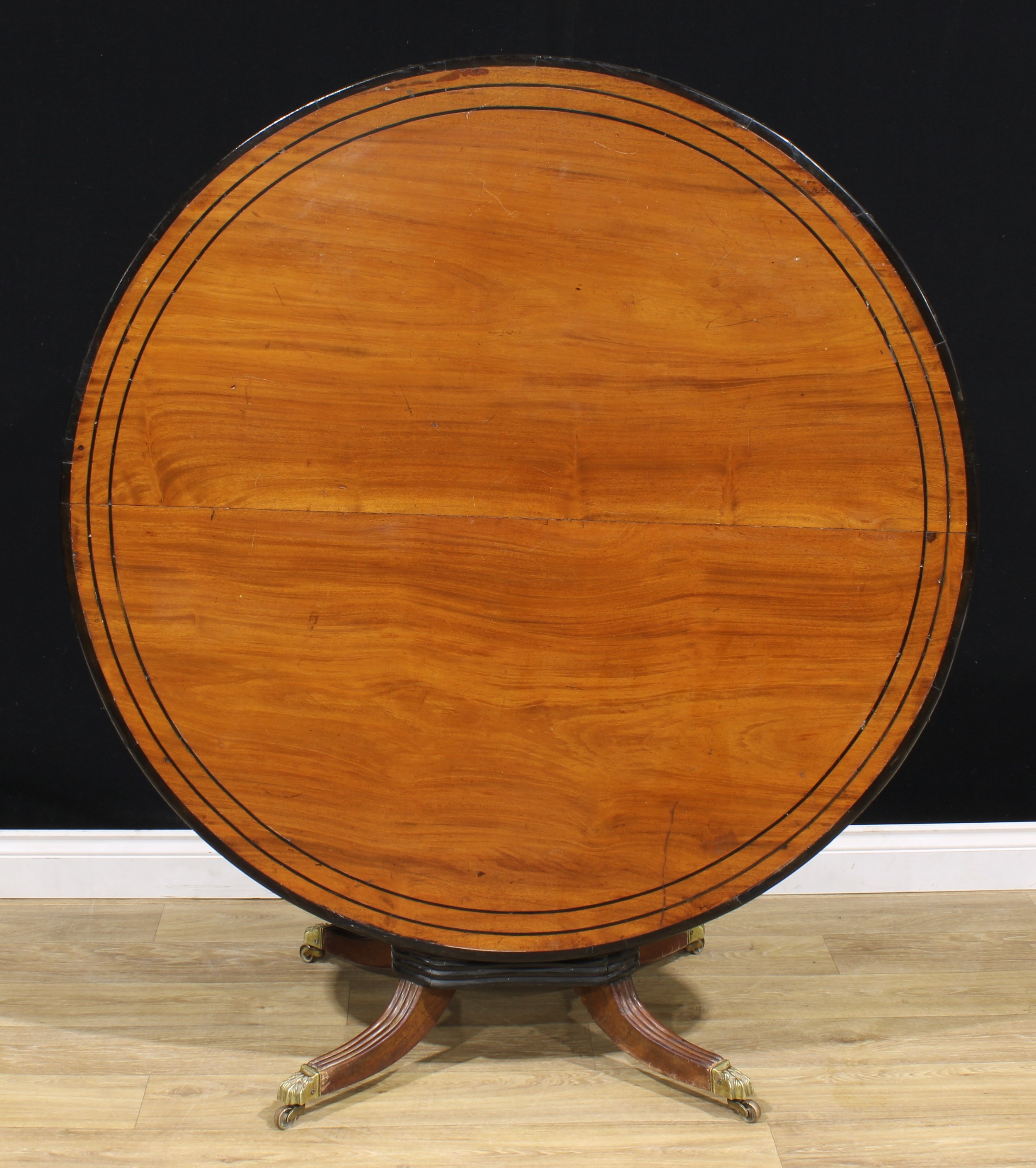 A 19th century Indo-Dutch jackfruit and ebonised centre table, circular tilting top turned and - Image 3 of 4