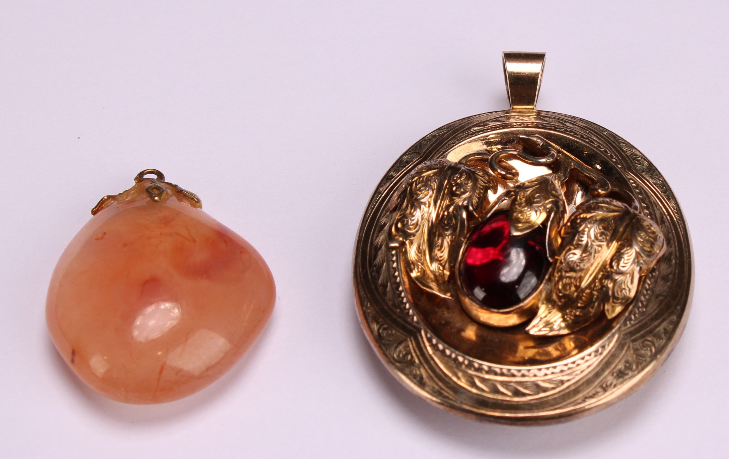 A Victorian gold coloured metal oval pendant, engraved with scrolls and centred by fruiting branches - Image 2 of 6