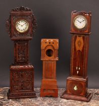 An early 20th century mahogany and marquetry miniature longcase clock, inlaid in the Secessionist