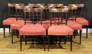 A set of eight 19th century Sheraton design parcel-satinwood banded mahogany dining chairs,