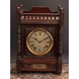 A late Victorian oak bracket-form mantel clock, 12cm circular dial inscribed PEARCE & SONS