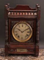 A late Victorian oak bracket-form mantel clock, 12cm circular dial inscribed PEARCE & SONS