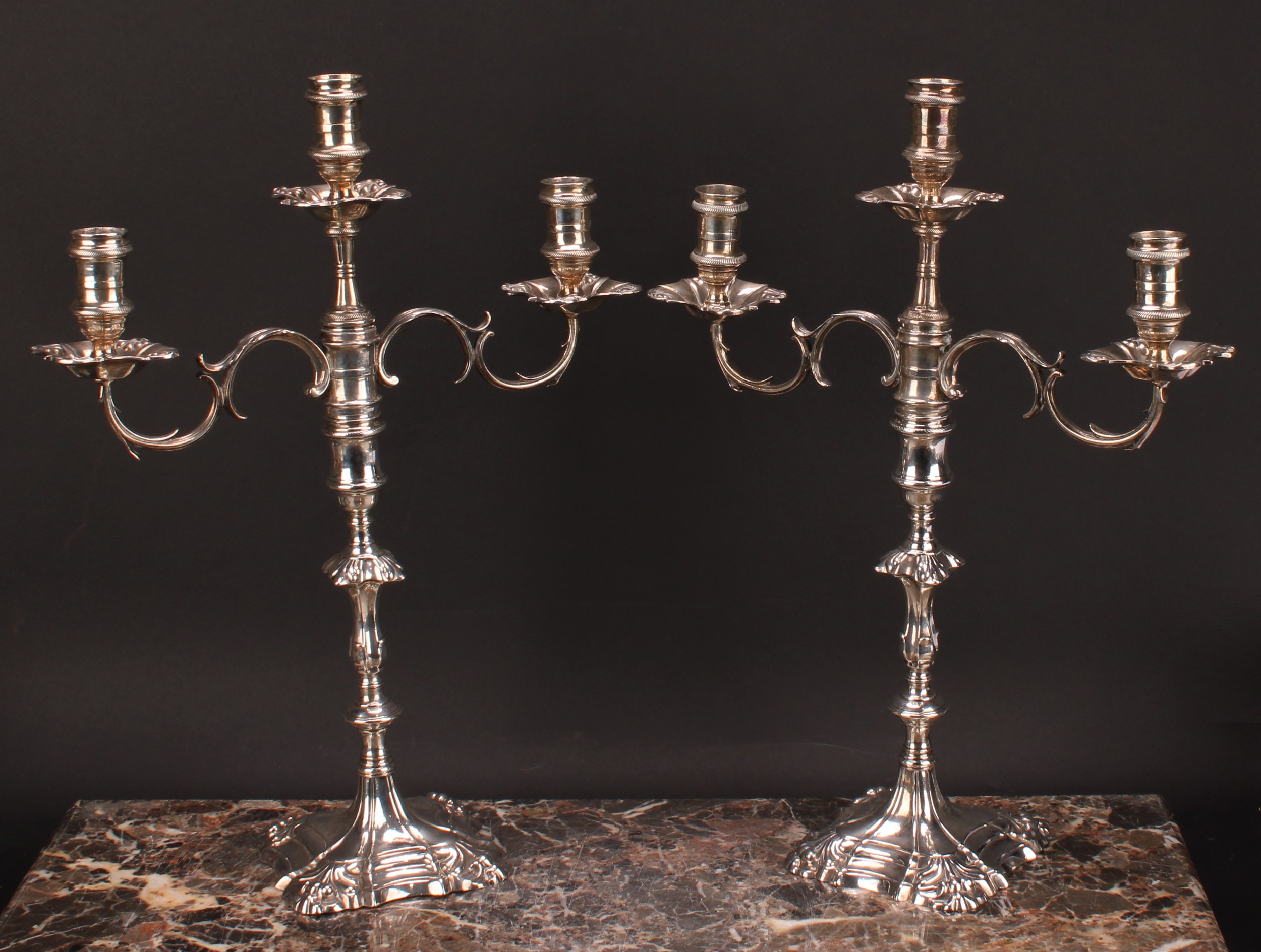 A pair of George II cast silver table candlesticks, fitted with Victorian three-light candelabra - Image 2 of 4