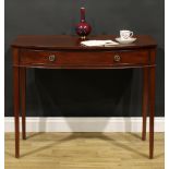 A 19th century mahogany bowfront side table, oversailing top above a long frieze drawer, tapered