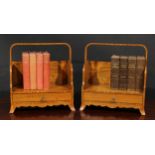 A pair of Sheraton Revival satinwood book carriers, each with arched handle and shaped three-quarter