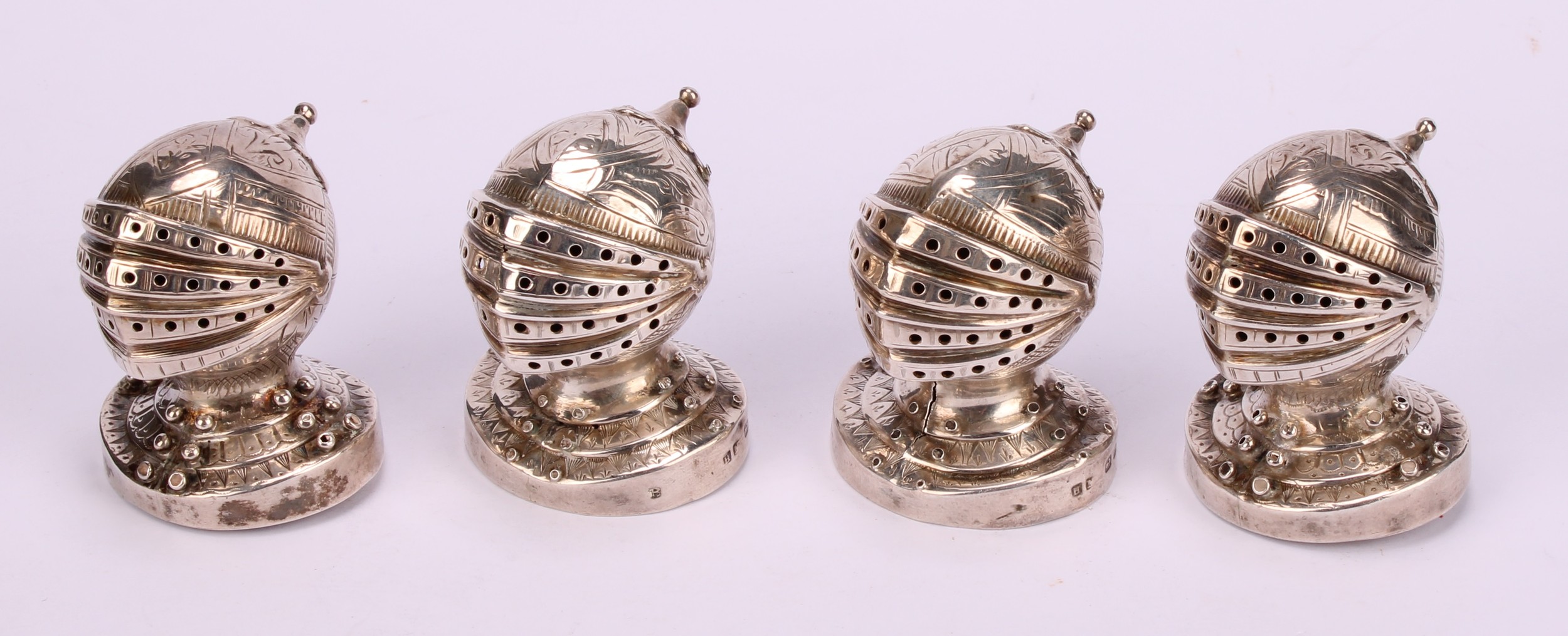 A set of four Victorian Gothic Revival silver novelty peppers, each as a knight's helmet and - Image 2 of 7