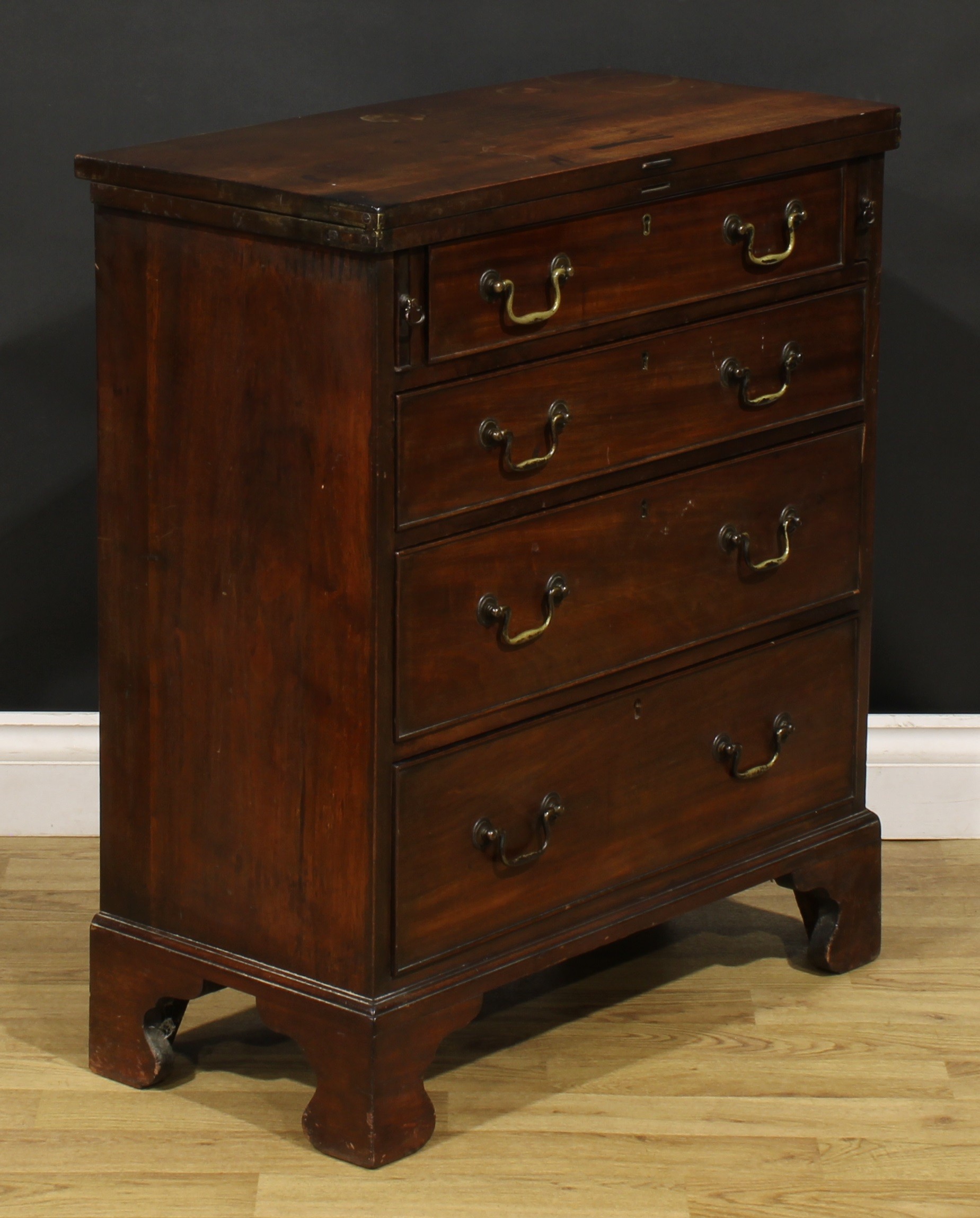 A 19th century mahogany bachelor’s chest, rectangular folding top above four long cockbeaded - Image 3 of 6