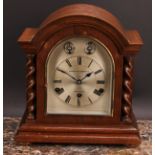 An early 20th century oak bracket clock, 14.5cm arched silvered dial inscribed A.MASON WILLIAMS &